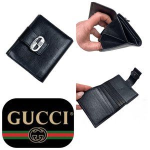 Auc Gucci Snappy Bi-fold GG vintage leather wallet